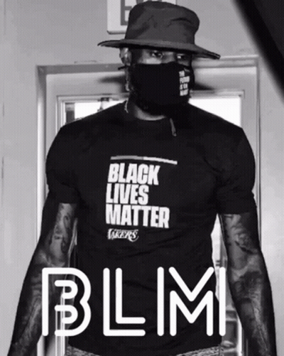 A Man Wearing A Shirt That Says Black Lives Matter GIF