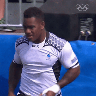 A Man Wearing A Shirt That Says Blk On The Front GIF