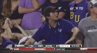 A Man Wearing A Shirt That Says ' Bu ' On It GIF