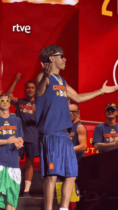 A Man Wearing A Shirt That Says ' Champions ' On It GIF
