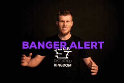 A Man Wearing A Shirt That Says Distorted Kingdom Is Screaming GIF