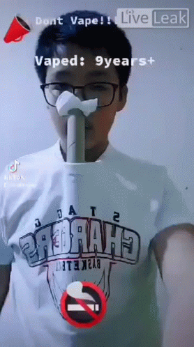 A Man Wearing A Shirt That Says " Dont Vape " GIF