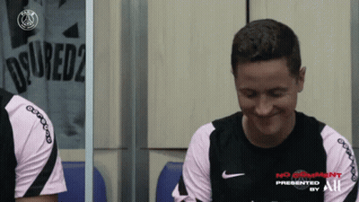 A Man Wearing A Shirt That Says Dsquared2 Laughs GIF