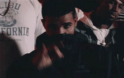A Man Wearing A Shirt That Says Fornia GIF