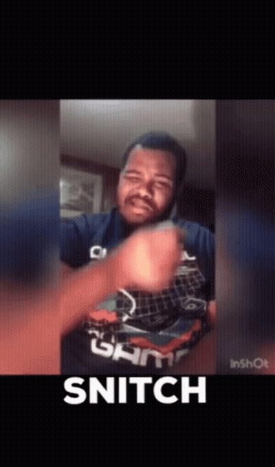 A Man Wearing A Shirt That Says Game Is Making A Snitch Gesture GIF