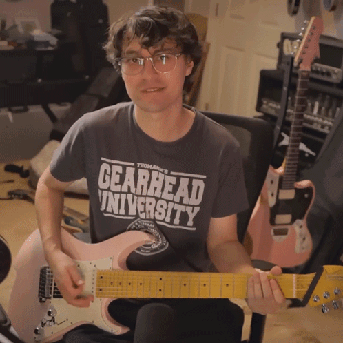 Man Wearing Gearhead University Shirt GIF