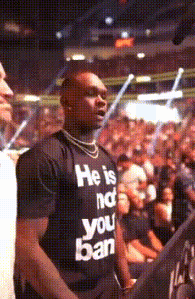 A Man Wearing A Shirt That Says He Is Not Your Ban GIF