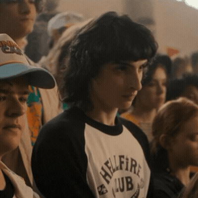 A Man Wearing A Shirt That Says Hellfire Club On It GIF