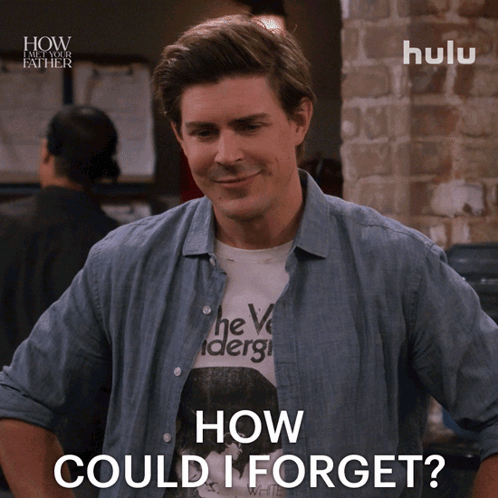 A Man Wearing A Shirt That Says How Could I Forget On It GIF