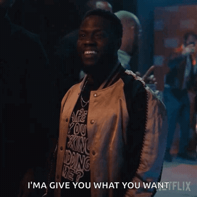 A Man Wearing A Shirt That Says I 'M Ma Give You What You Want On It GIF