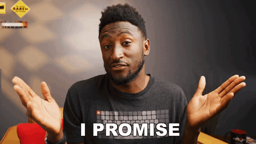 A Man Wearing A Shirt That Says " I Promise " GIF