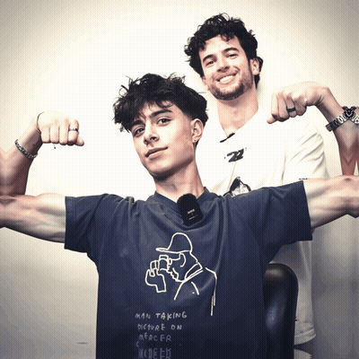A Man Wearing A Shirt That Says Man Taking Picture On Nerdfr GIF