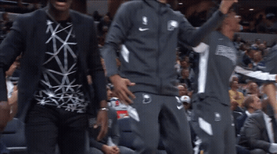 A Man Wearing A Shirt That Says ' Nba ' On It GIF