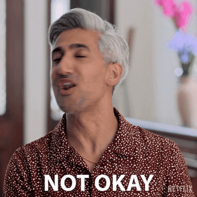 A Man Wearing A Shirt That Says Not Okay GIF