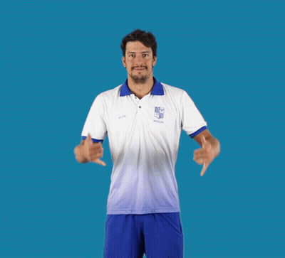 A Man Wearing A Shirt That Says ' Noticias ' On It Giving A Thumbs Up GIF