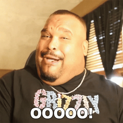 A Man Wearing A Shirt That Says ' O00000 ' On It GIF