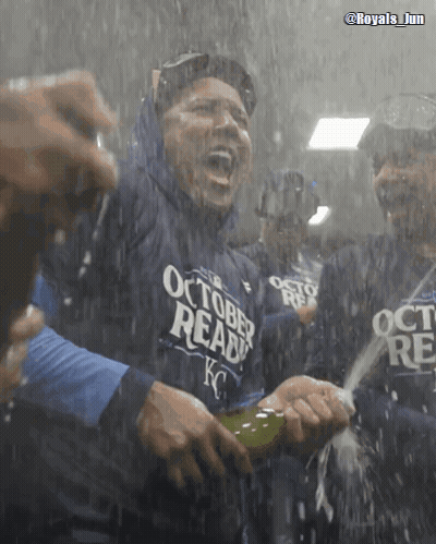 A Man Wearing A Shirt That Says October Ready Is Holding A Bottle Of Champagne GIF