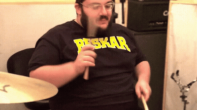 A Man Wearing A Shirt That Says Peskar On It GIF