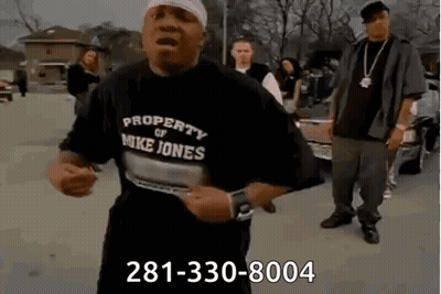 A Man Wearing A Shirt That Says Property Of Mike Jones GIF