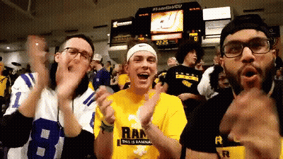 A Man Wearing A Shirt That Says Ran Is Clapping GIF