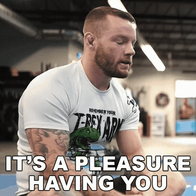 A Man Wearing A Shirt That Says Remember Your T-Rex Army GIF