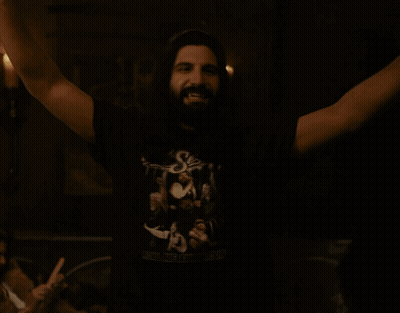 A Man Wearing A Shirt That Says ' Rolling Away ' On It GIF