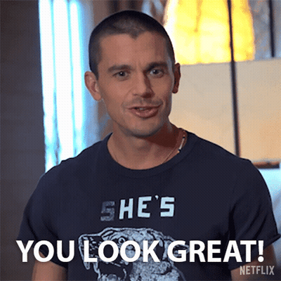 A Man Wearing A Shirt That Says " She 'S " On It GIF