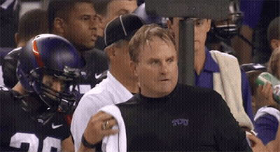 A Man Wearing A Shirt That Says Tcu Stands In A Crowd GIF