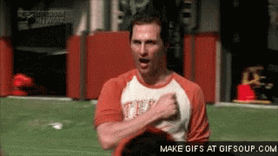 A Man Wearing A Shirt That Says Texas Is Standing On A Field GIF