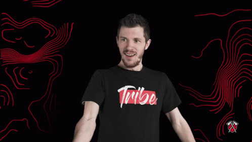 A Man Wearing A Shirt That Says Trube Holds A Wrench GIF