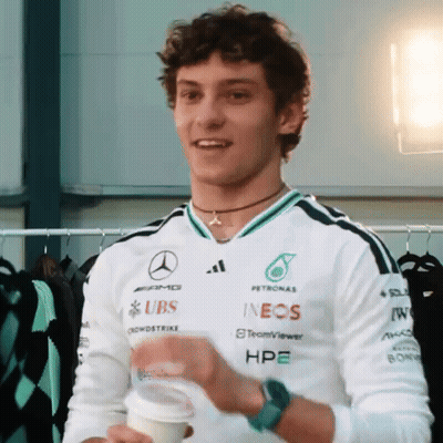 A Man Wearing A Shirt That Says Ubs And Ineos On It GIF