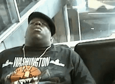 A Man Wearing A Shirt That Says Washington On It GIF