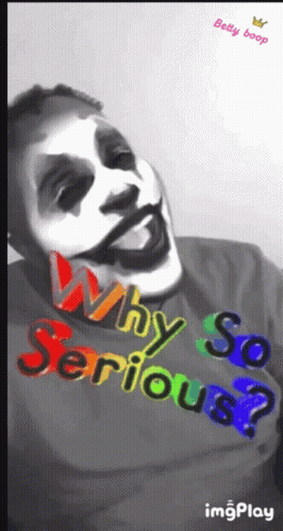 A Man Wearing A Shirt That Says " Why So Serious " GIF