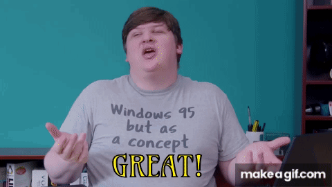 A Man Wearing A Shirt That Says " Windows 95 But As A Concept Great " GIF