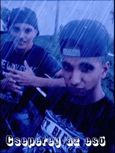 A Man Wearing A Shirt That Says ' Y Bill ' On It Is Standing In The Rain GIF