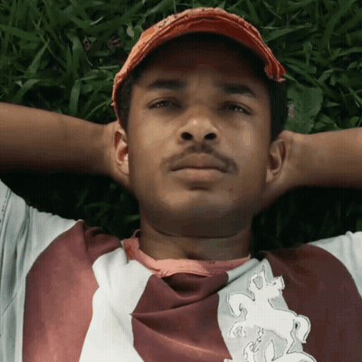 A Man Wearing A Shirt With A Horse On It GIF