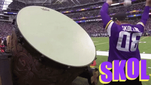 A Man Wearing A Skoll Jersey Stands On A Football Field GIF