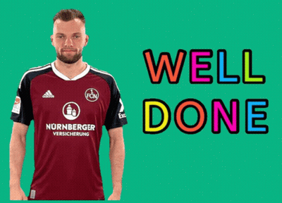 A Man Wearing A Soccer Jersey That Says Nurnberger Versicherung GIF