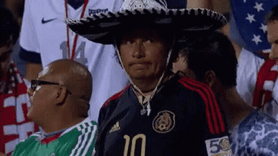 A Man Wearing A Sombrero And A Jersey With The Number 10 On It GIF