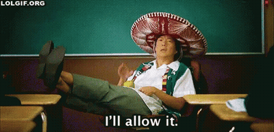 A Man Wearing A Sombrero Is Sitting In A Classroom With His Legs Crossed And Says I 'Ll Allow It . GIF