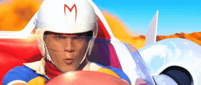 A Man Wearing A Speed Racer Helmet With A Red M On It GIF