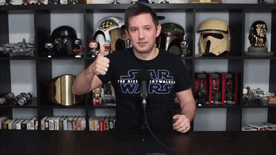 A Man Wearing A Star Wars T-Shirt Giving A Thumbs Up GIF