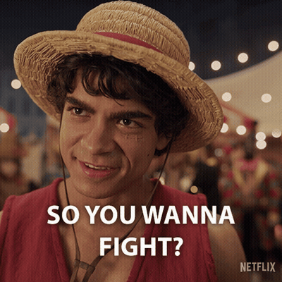 A Man Wearing A Straw Hat And A Red Shirt Says " So You Wanna Fight " GIF