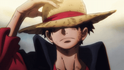 A Man Wearing A Straw Hat With A Red Ribbon GIF