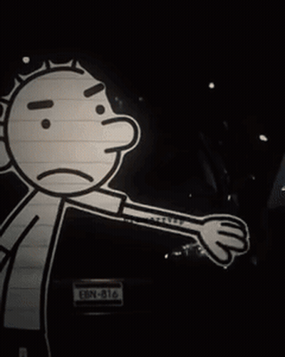 A Man Wearing A Striped Shirt And Tie Looks At The Camera GIF