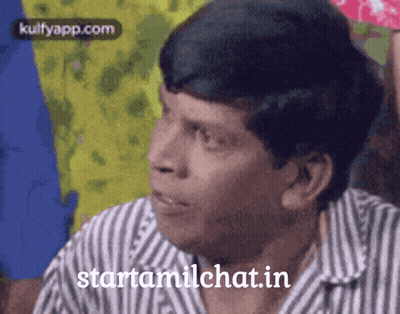 A Man Wearing A Striped Shirt Says Starttamilchat.in On The Bottom GIF