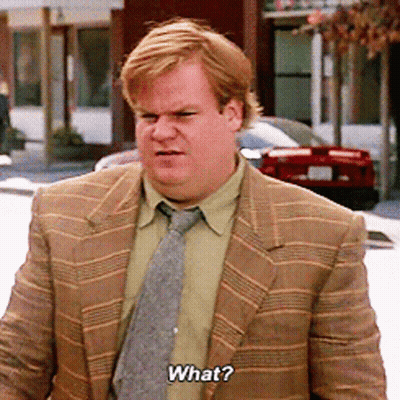 A Man Wearing A Suit And Tie Is Asking What GIF
