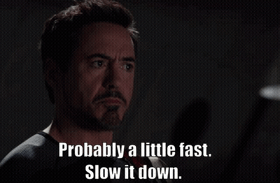 A Man Wearing A Superhero Costume Says Probably A Little Fast Slow It Down GIF
