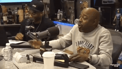 A Man Wearing A Sweater That Says " I Have Heart " GIF