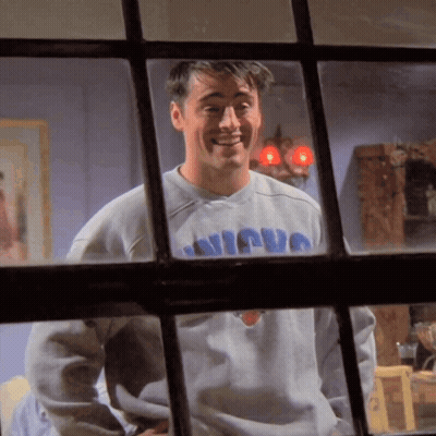 A Man Wearing A Sweater That Says Nicuo On It GIF